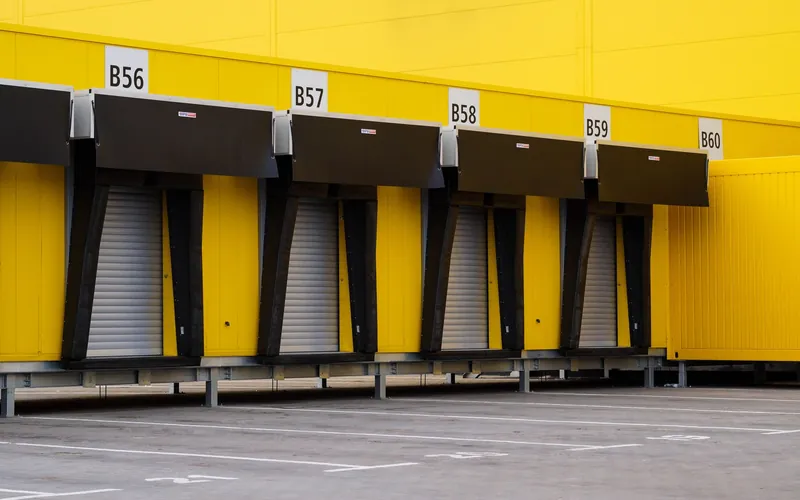 A distribution warehouse with loading docks along its face